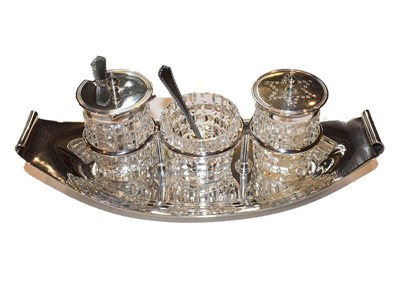 Lot 291 - Silver oval condiment stand with cut glass...