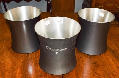 Lot 209 - A set of three pewter Dom Perignon Champagne...
