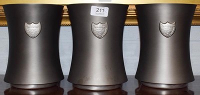 Lot 211 - A set of three pewter Dom Perignon Champagne...
