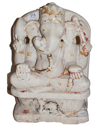 Lot 315 - An Indian carved alabaster and polychrome...
