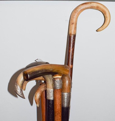 Lot 330 - Eight various horn handled walking sticks,...