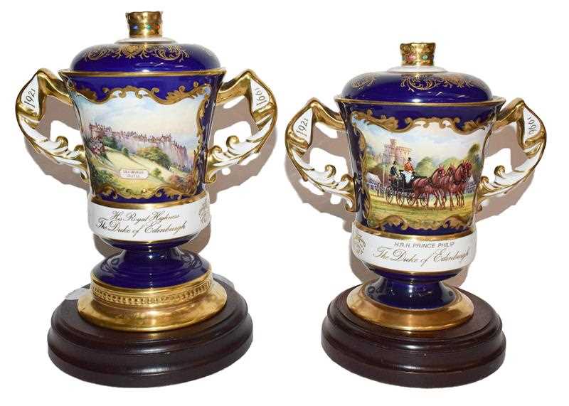 Lot 53 - Two Aynsley twin handled cups and covers, one...