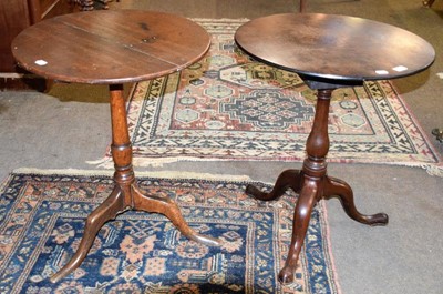 Lot 1233 - A George III oak snap top tripod table,...