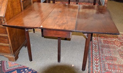 Lot 1234 - A 19th century mahogany gateleg dining table,...