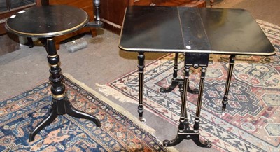 Lot 1235 - A Victorian parcel gilt ebonized reading table,...