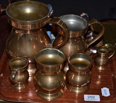 Lot 292 - Set of six graduated brass measures