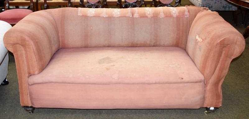 Lot 1268 - A Victorian drop arm Chesterfield style sofa...