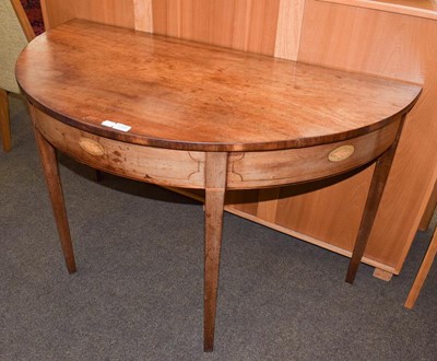 Lot 1306 - A Georgian mahogany D end table inlaid with...