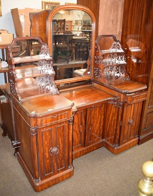 Lot 1312 - A Victorian mahogany breakfront dressing table...