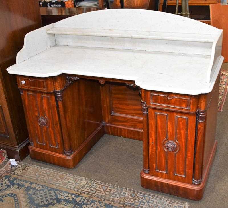 Lot 1317 - A Victorian mahogany marble top breakfront...