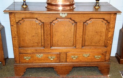 Lot 1333 - A George III oak mule chest, the front with...