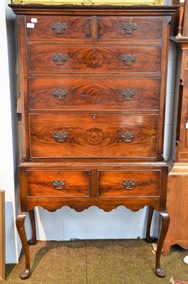 Lot 1335 - An Edwardian mahogany chest on stand, 94cm by...