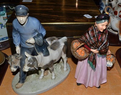 Lot 299 - Doulton ";Orange Lady"; figure and a Copenhagen cow herder figure (2)