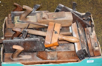 Lot 1137 - A box of 19th century woodworking planes,...