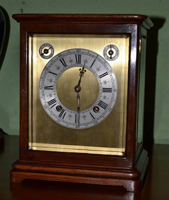 Lot 311 - French oak four plate twin train mantel clock