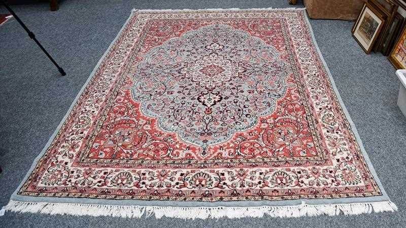 Lot 1171 - An Indian carpet, the ice blue field of...