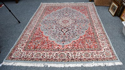 Lot 1171 - An Indian carpet, the ice blue field of...