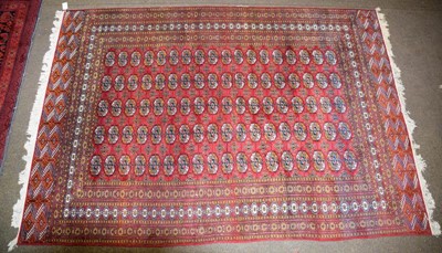 Lot 1285 - Pakistani Bukhara carpet, the crimson field...
