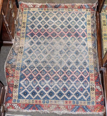 Lot 1290 - Gendje rug, the indigo stepped lattice field...