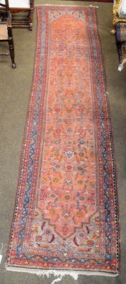 Lot 1292 - A North West Persian runner, the herati field...