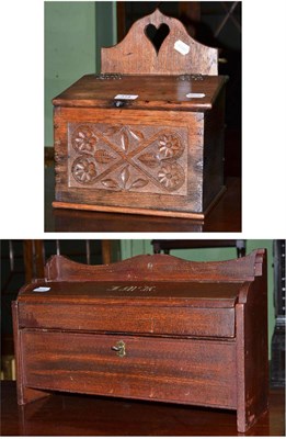 Lot 314 - Wooden wall mounted knife box, initials J.McK; together with a carved oak candle box (2)