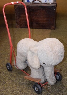 Lot 1122 - A pull-a-long Elephant by Pedigree Soft Toys...