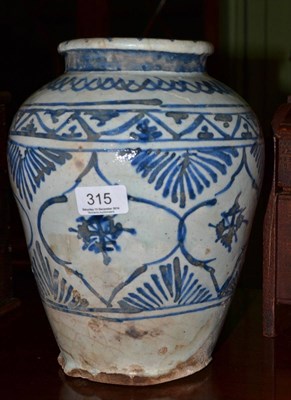 Lot 315 - A Persian faience jar, probably 17th century, of baluster form with flared neck, painted in...