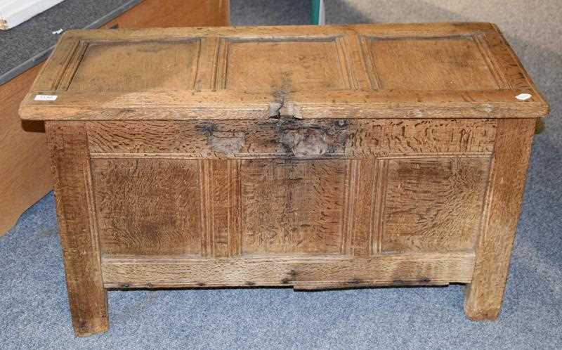Lot 1148 - An 18th century panelled oak coffer, 97cm by...