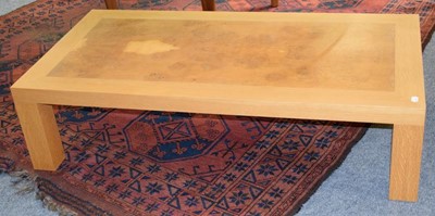 Lot 1156 - A Heals oak coffee table, 140cm by 70cm by...