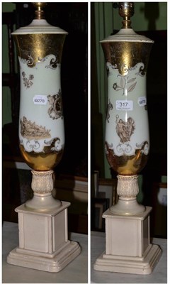 Lot 317 - Pair of Italian glass lamps on cream pedestal bases