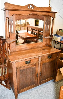 Lot 1166 - An Arts & Crafts mirror backed sideboard, the...