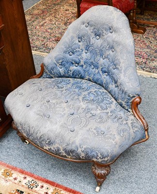Lot 1172 - A Victorian walnut framed button upholstered...
