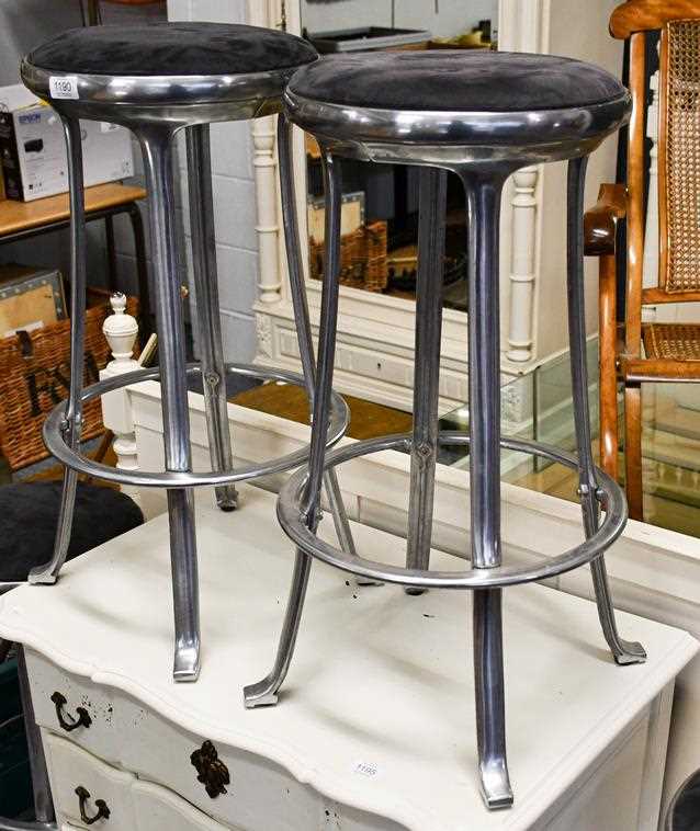 Lot 1190 - A set of four chromed bar stools