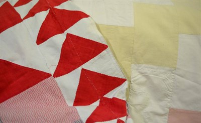 Lot 320 - Turkey red and white geometric patchwork cover with printed cotton patches in pink and mauve, and a