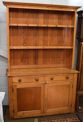 Lot 1212 - A Victorian pine kitchen dresser, the shelved...