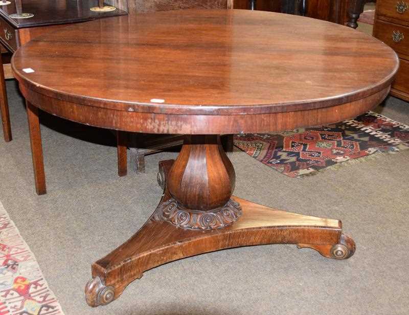 Lot 1228 - A Regency rosewood circular breakfast table,...