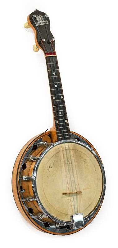Lot 3059 - George Formby Banjolele no.D/2025, with 7 3/4"...