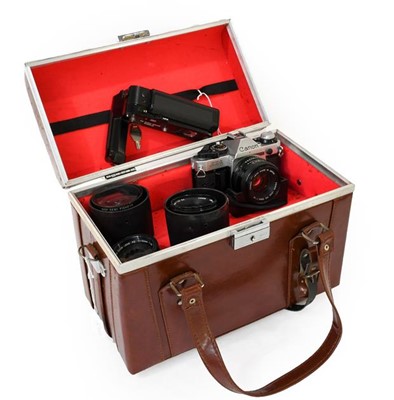 Lot 3269 - Canon AE1 Program Camera with Canon FD lenses:...