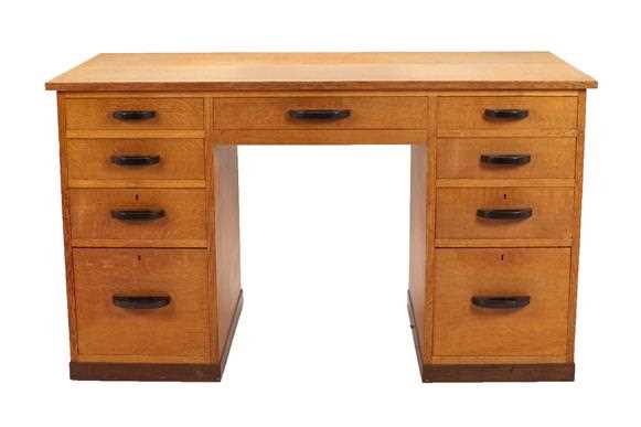 Lot 2251 - Hubert Simpson (1889-1975): An Oak Desk, the...