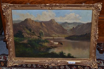 Lot 390 - A 19th century oil on canvas, mountain landscape with cattle and sheep, signed Breanski, dated 1889