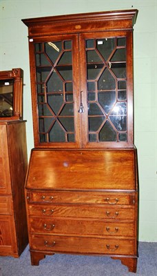 Lot 412 - An Edwardian bureau bookcase