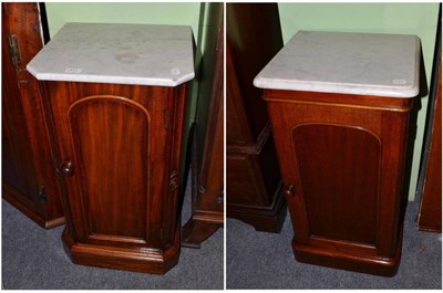 Lot 417 - Two marble top bedside cabinets