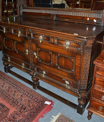 Lot 422 - Circa 1930's carved oak sideboard