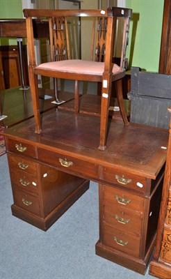 Lot 428 - An Edwardian mahogany desk and mahogany bow armchair