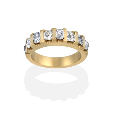 Lot 2395 - A Diamond Half Hoop Ring