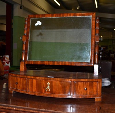 Lot 432 - A 19th century mahogany framed toilet mirror with three drawers below