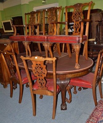 Lot 434 - Edwardian mahogany extending dining table with one extra leaf and winder, together with eight...