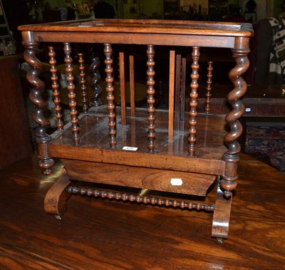 Lot 438 - A 19th century rosewood Canterbury with turned supports and drawers below