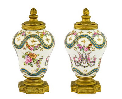 Lot 82 - A Pair of Gilt Metal Mounted Serves Style...