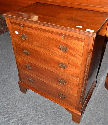 Lot 442 - Small mahogany four height chest of drawers with brushing slide and carved decoration to the...